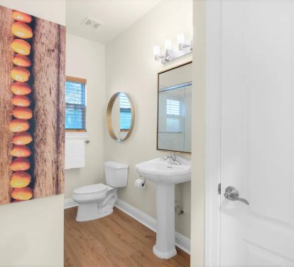 Shipwatch-23...1st floor. Shared hall full bath. with frameless glass tub/shower combo. Photo 1