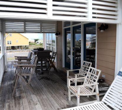 Main deck with pub and lounge chairs