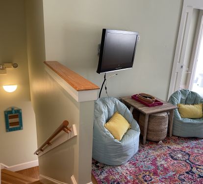 Convertible conversational seating with Prime Stick enabled TV