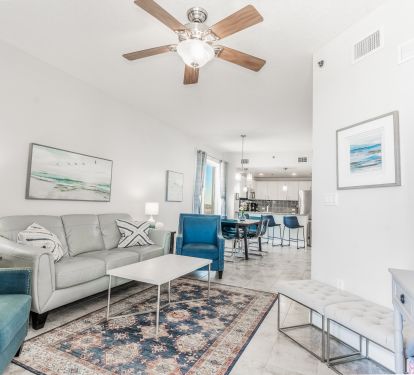 Living room with balcony entrance, smart tv