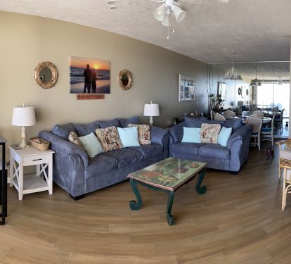 Living Room with pull out sofa and patio access. 