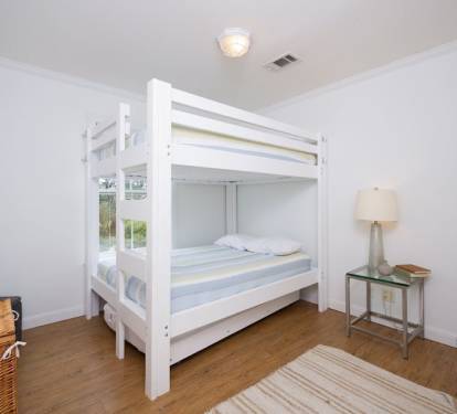 Full over Full bunk bed with twin trundle in the guest bedroom