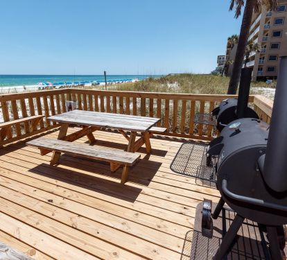 There are three charcoal grills and plenty of seating for outdoor dining. 