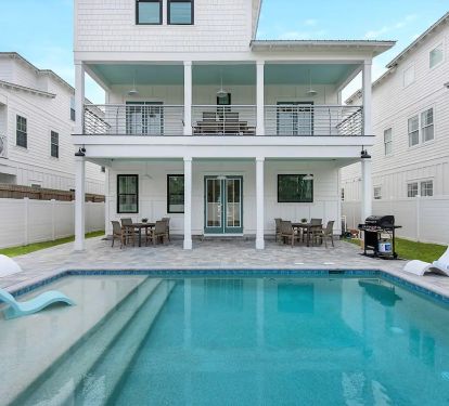Windsong-23 Private pool with splash deck (seasonally heated between October and April). Multiple seating options for relaxing, dining and sunbathing around the pool.