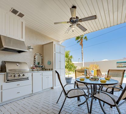 Outdoor Kitchen and Dining right by the pool
