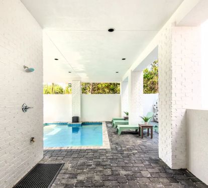 Horizon-8 After you've enjoyed the sun at Horizon's private, gated beach just across the street, shower of the sand and salt and relax in Horizon's covered pool.
