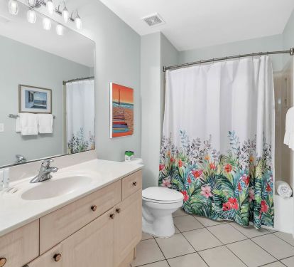 Full bathroom attached to guest suite (also accessible from the hall)