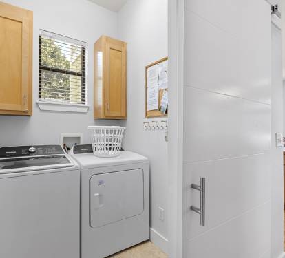 High efficiency, large capacity washer and dryer on the main level 