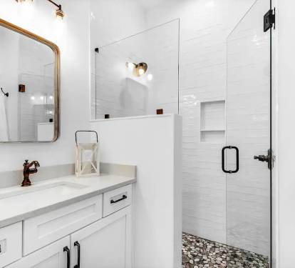 Latitude-16 1st floor. Bed 1 bath, photo 2. King master suite with frameless glass, tiled shower and quartz vanity.