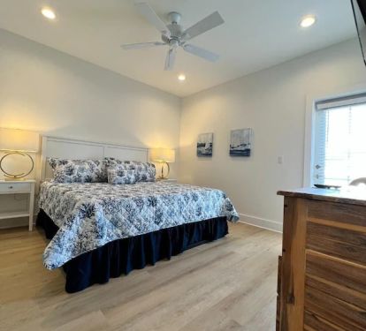 Bedroom 5 with King memory foam mattress. This room also has a private balcony with lounge chairs overlooking the pool (of note for families with little ones, this is a second-floor room).
