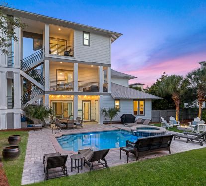 Private Backyard with a Heated Pool, Hot Tub, Fire Pit, Lounge Chairs and more!