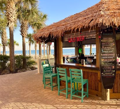 Enjoy the TIKI bar between the pools for a refreshing cocktail or smoothie!