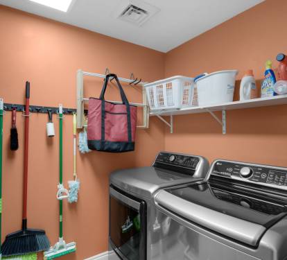 Laundry room has full size Washer &amp; Dryer