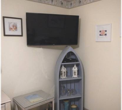 43" wall mounted TV in bedroom