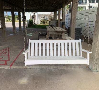 Porch Swing in shade under house
