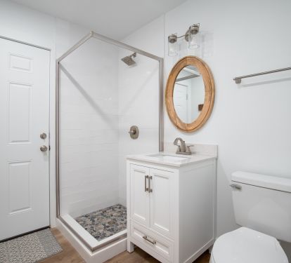 Adjacent bathroom off of the hall/game room with access to the pool/patio area.