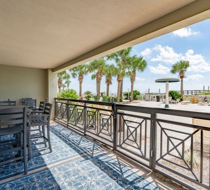 Ground-floor Gulf views with direct beach walkout.
