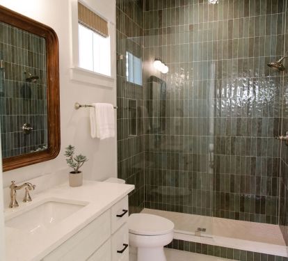 Walk-in luxury shower and spacious vanity in the bath.