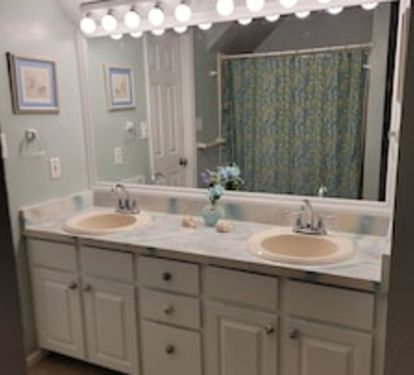 Upper bathroom connecting main king bedroom and bunk area