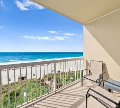 Private Gulf-front balcony with seating and unobstructed beach and ocean views