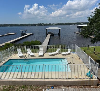 View from balcony, overlooking pool, lagoon