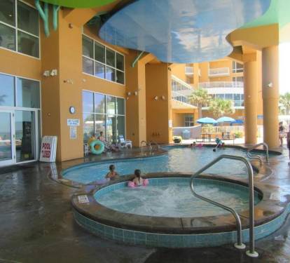 Hot-Tub next to covered heated pool.