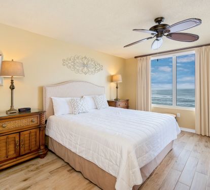 The master suite has new faux-wood tile, generous storage and stunning view