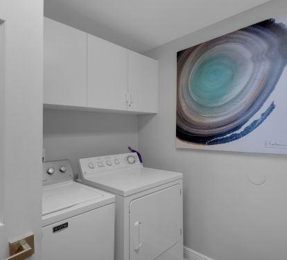 Laundry room with full size washer &amp; dryer