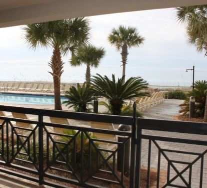 Patio view - both pool deck and ocean can be seen, unusual for 1st floor condos
