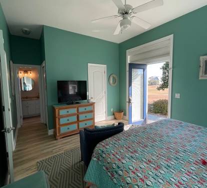 Master Bedroom with access to back patio