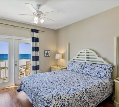 Second level king bedroom with incredible balcony beach views!