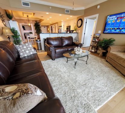 Living Room has 65 inch Smart TV and a beautiful view of gulf!