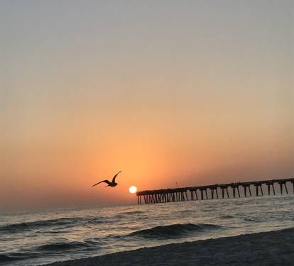 Amazing sunset views from the beach or balcony.  Russell Fields Pier visible