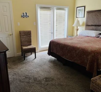 King bedroom on main level by kitchen. 