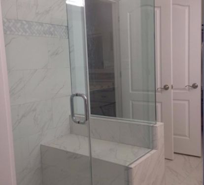 New over sized tile shower with marble accents added in 2017!