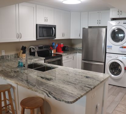Updated fully stocked kitchen with Keurig, coffee maker, crock pot and more