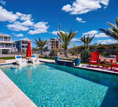 Large 15x25' pool with waterfall, sunshelf, sunshades and spectacular ocean view