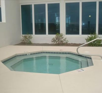 Relax in one of the two Gulf Front Hot Tubs