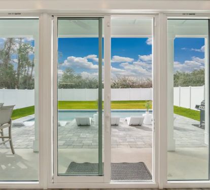 Ovation-9 Enjoy Ovation's panoramic pool view from the living, dining and kitchen.
