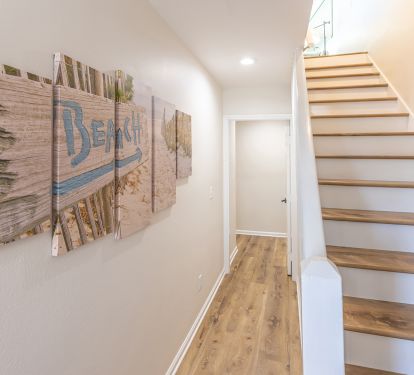 entry: straight to downstairs and beach access point 1, upstairs to main floor and beach access 2
