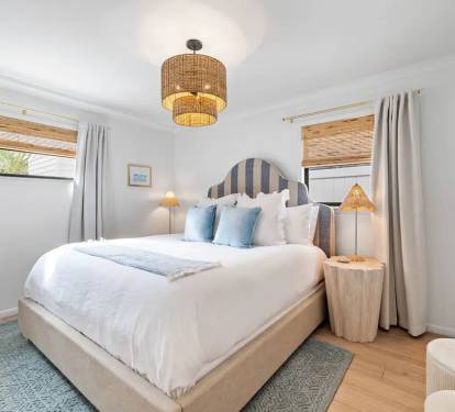 Master bedroom with King bed, tv, private 1/2 bath