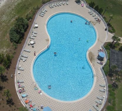 View of Beach Colony pool from your 15th floor balcony