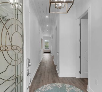 Vibe-3 Welcome to Vibe. Hand cut shiplap ceilings and driftwood colored floors create a vintage beach cottage feel.