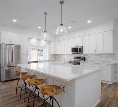 Enjoy time together in the large open kitchen living area. Huge island has seating for 4.