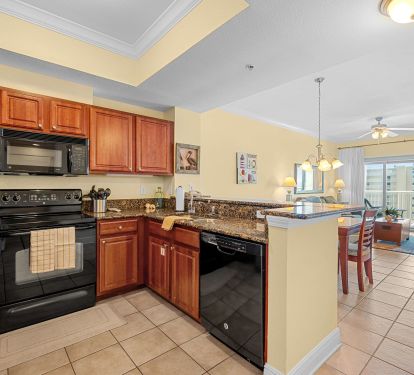 Kitchen with cooking utensils, coffee maker, toaster and all your cooking essentials.