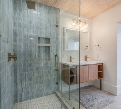 Downstairs full bath with double vanity and laundry