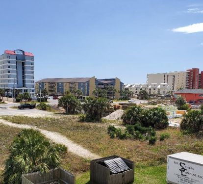 4 min walking path to public beach access, right of condo