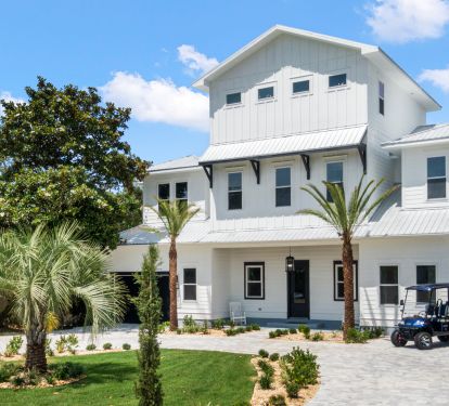 Front of home has parking for 5 cars plus golf cart
