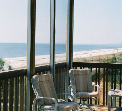 Beach side screened in porch (looking West)