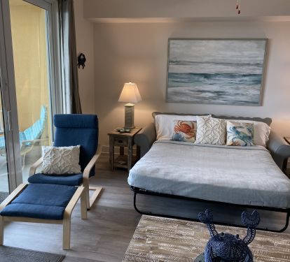 Queen sleep sofa turns the great room into a comfy guest bedroom at night!
